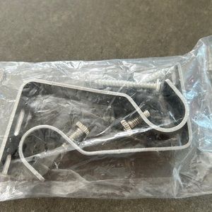 Silver curtain rod brackets.